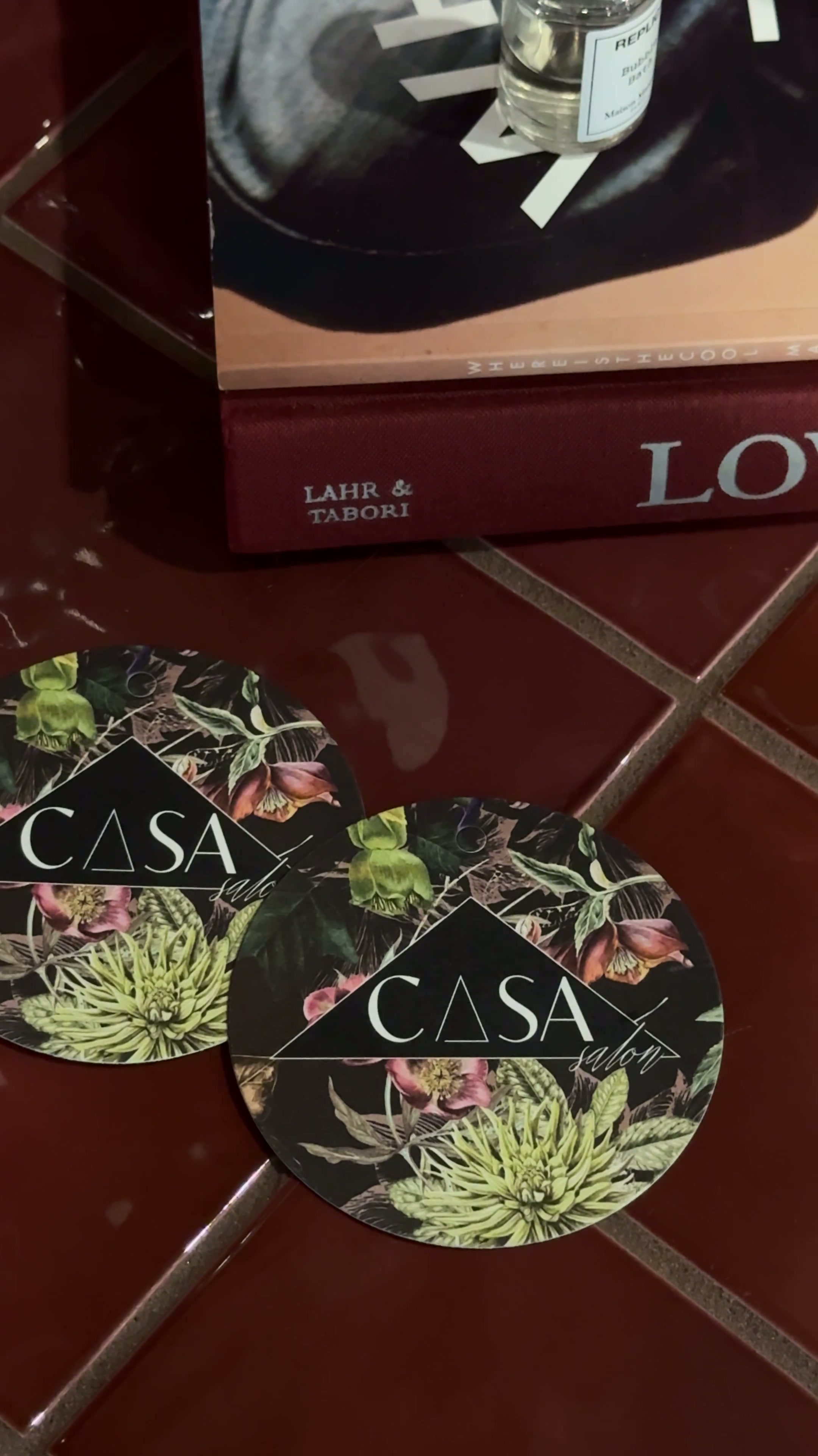 Casa Skin cards and products styled on the red tile table